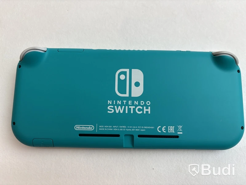 Nintendo Switch lite blå med originalförpackning