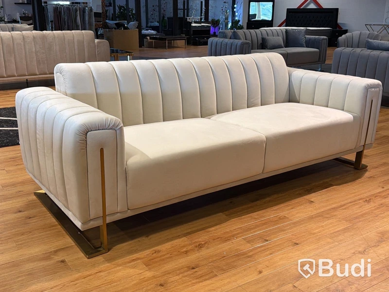 Soffa i beige sammet
