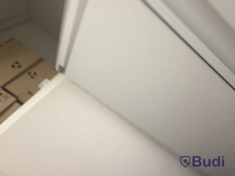 2 metal storage cabinets with double doors