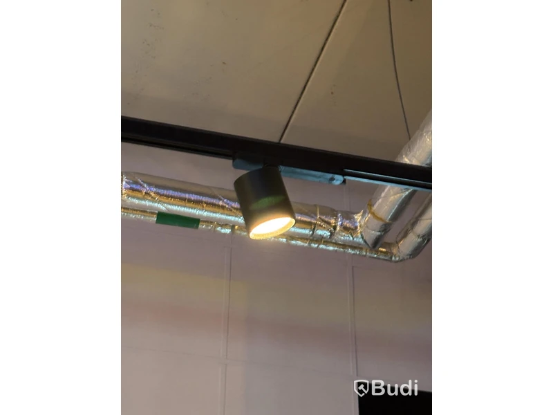 Track-mounted spotlights and lamps