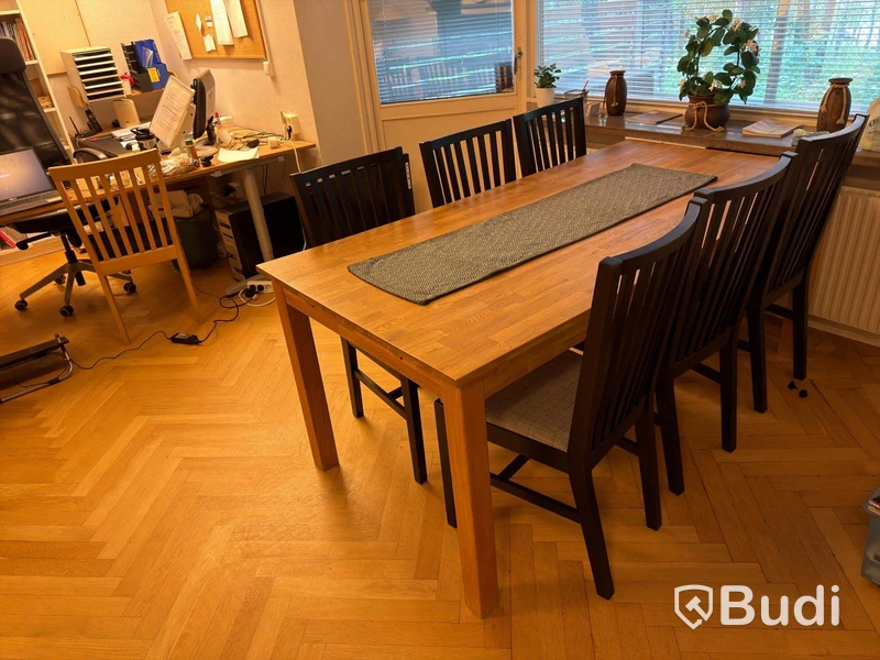 Wooden dining table with chairs