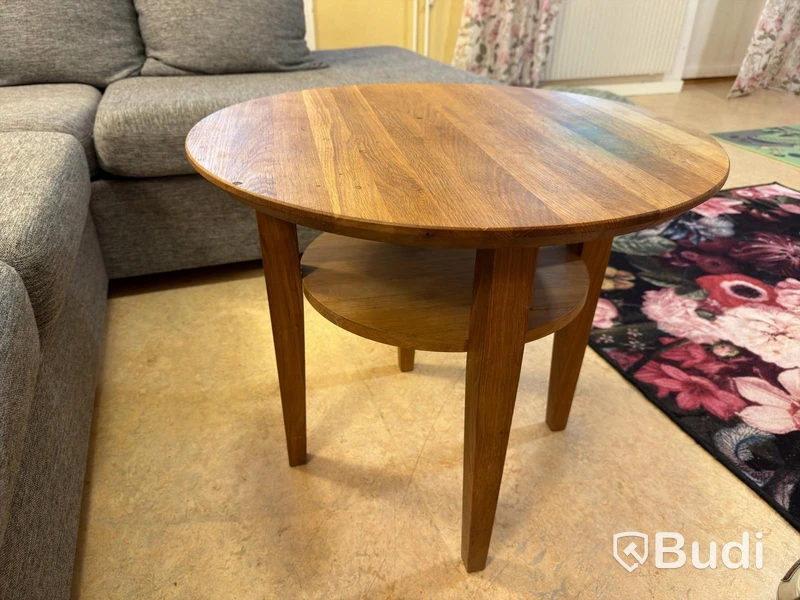 Sofa with chaise sections, coffee table and armchair