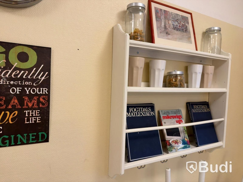 2 wall shelves and assorted decorative items.