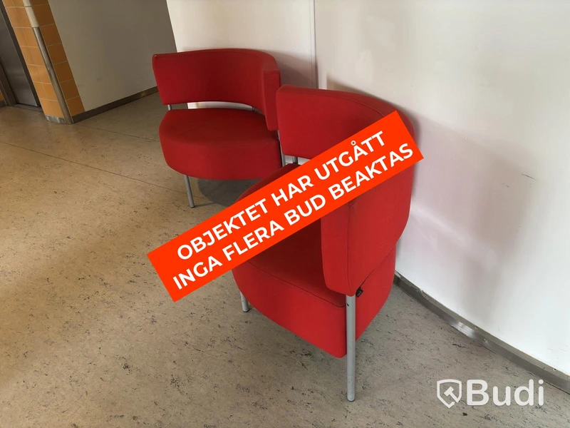 2 red Mitab armchairs