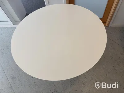 2 white round tables