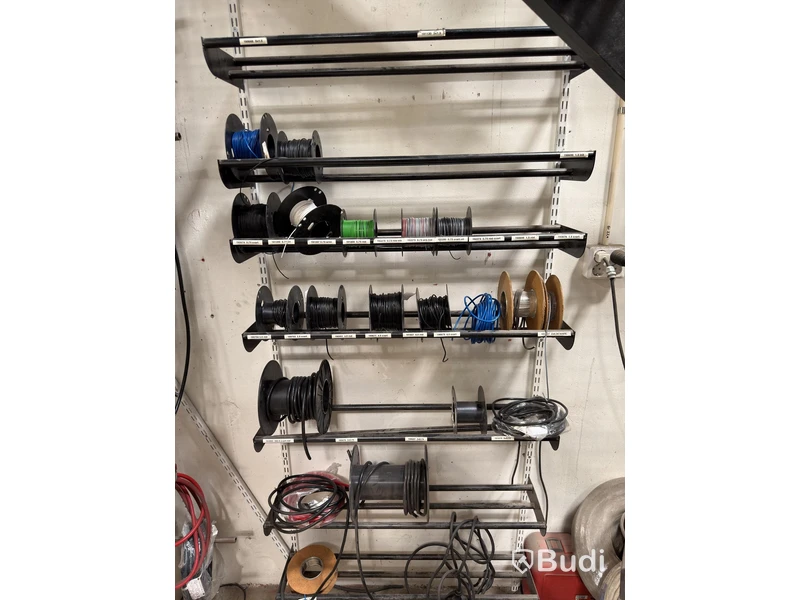 Storage shelving units with a large quantity of assorted bolts, nuts, etc.