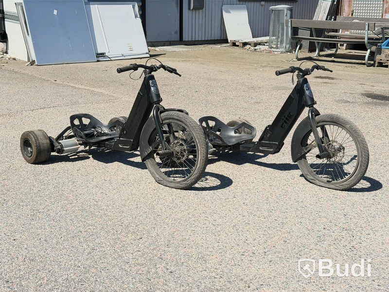 2 three-wheeled battery-powered drift trikes, FIIK Drifter