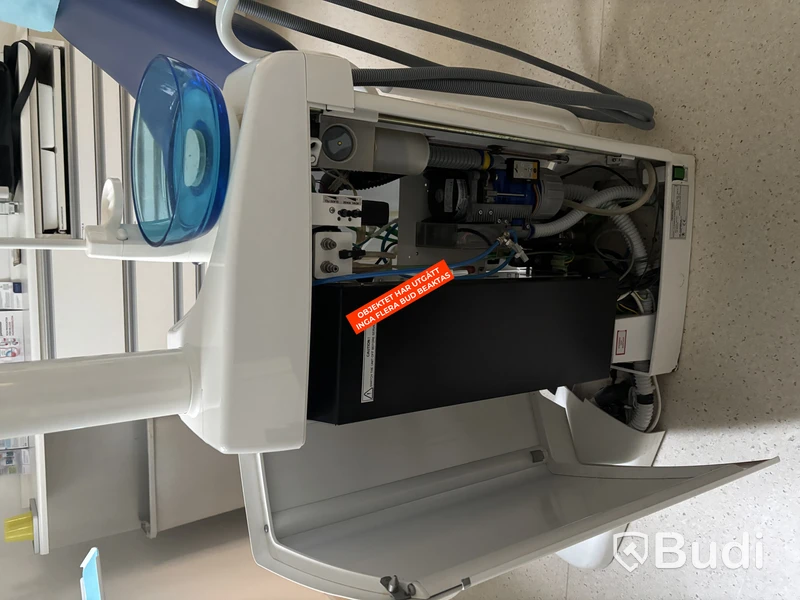 Dental chair PLANMECA COMPACT i with instrument unit and operating light