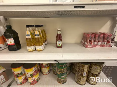Shelving system with contents, including disposable items and dry goods