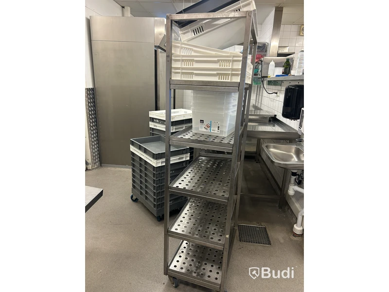 3 stainless steel shelving units with contents and bins