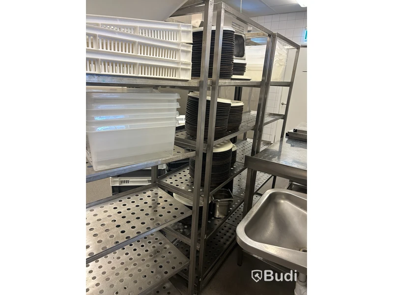3 stainless steel shelving units with contents and bins