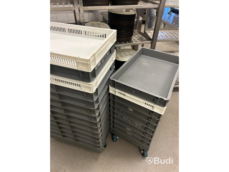 3 stainless steel shelving units with contents and bins