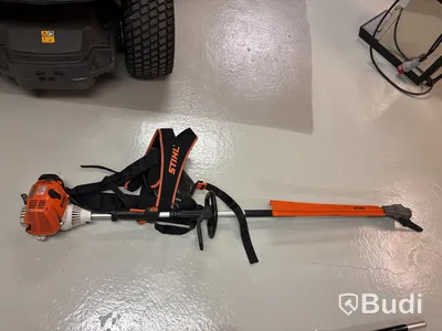 Long-reach hedge trimmer Stihl HL 100 with harness