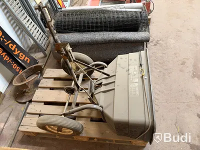 Tow-behind fertilizer spreader