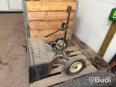 Tow-behind fertilizer spreader