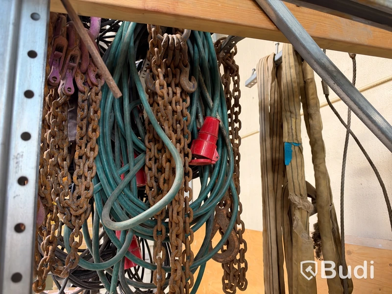 Lot of electrical cables, chains and lifting slings