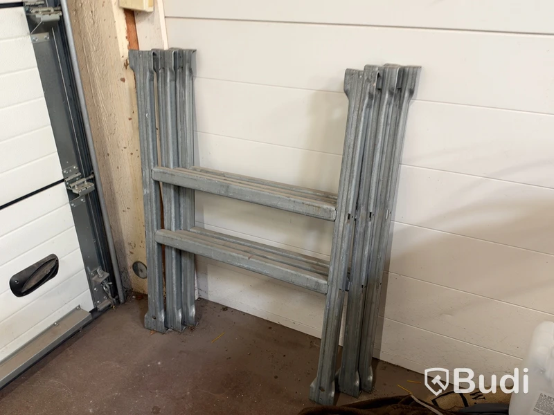 3 sections of pallet racking with pallet supports
