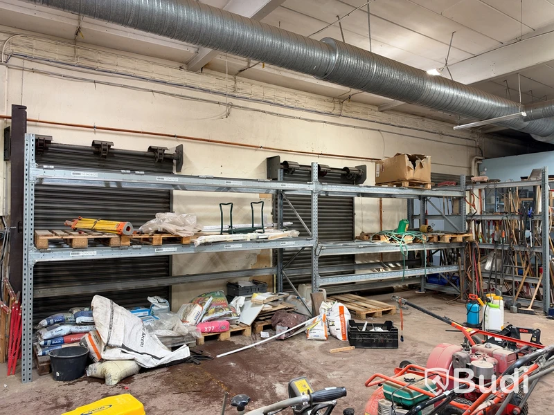 3 sections of pallet racking with pallet supports