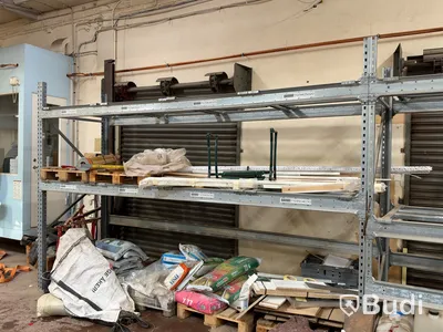 3 sections of pallet racking with pallet supports
