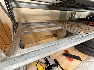 3 sections of pallet racking with pallet supports