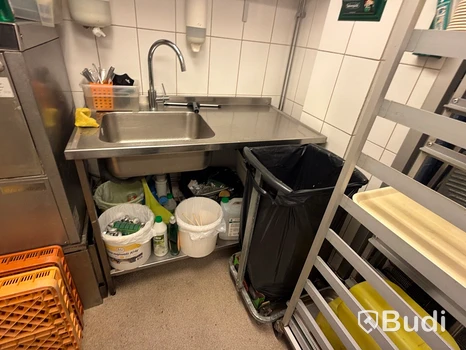Stainless steel workbench with sink and mixer tap