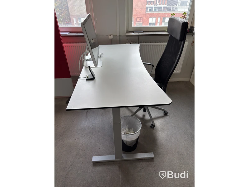 Height-adjustable desk including office chair