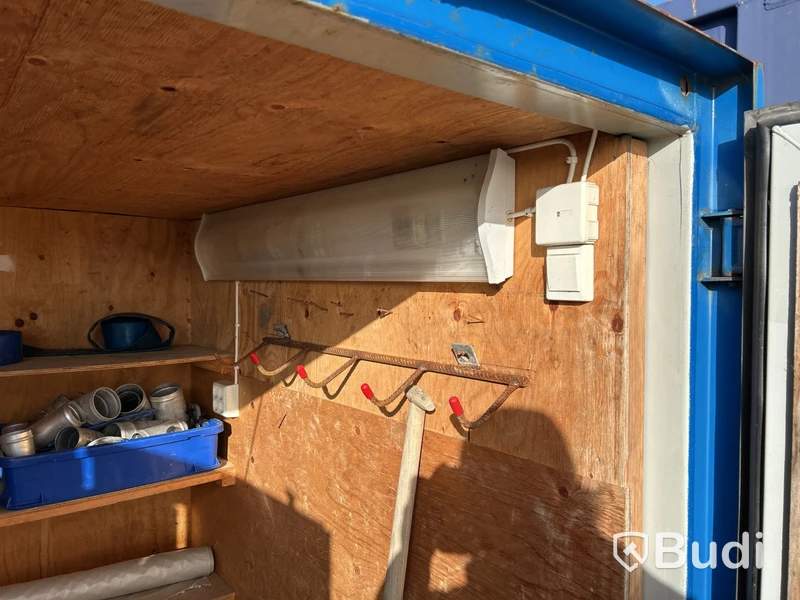 Storage container with shelves and lighting