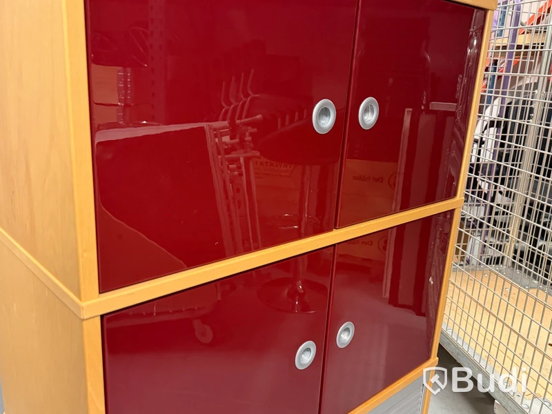 IKEA cabinet with red doors and tambour-door compartment