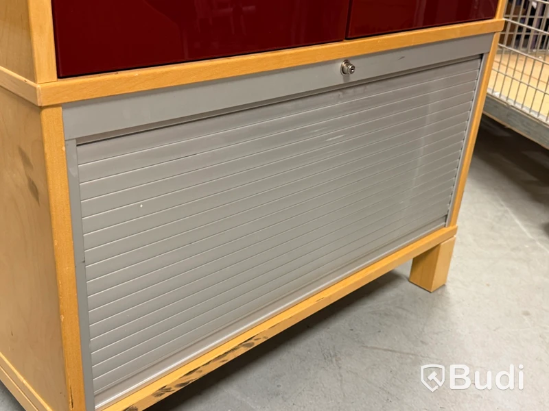 IKEA cabinet with red doors and tambour-door compartment