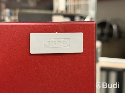 IKEA cabinet with red doors and tambour-door compartment