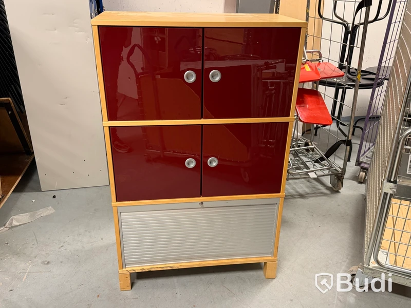 IKEA cabinet with red doors and tambour-door compartment