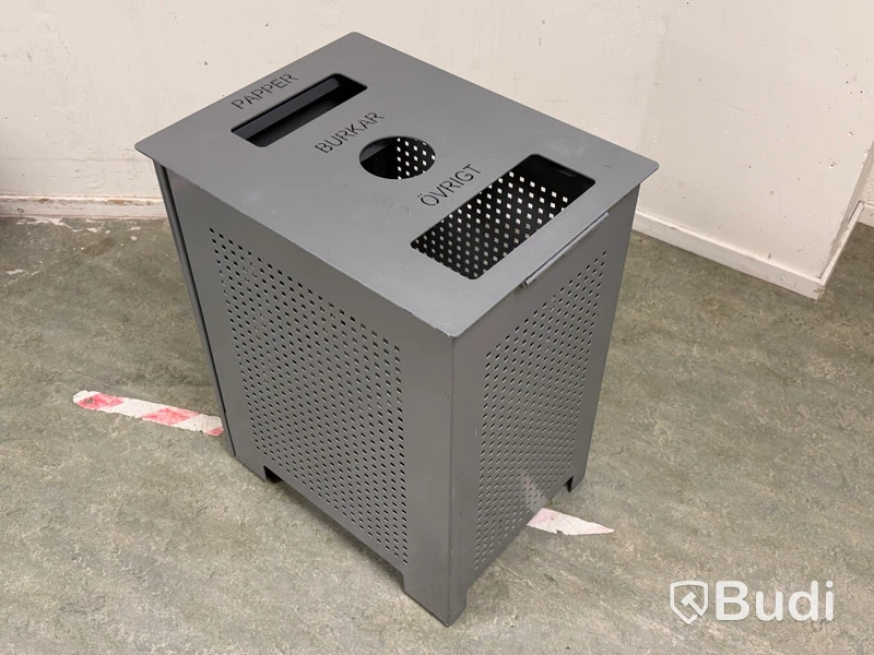 Recycling bin with three compartments for paper, cans and other waste