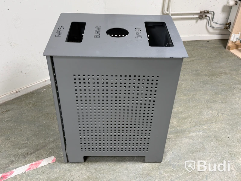Recycling bin with three compartments for paper, cans and other waste