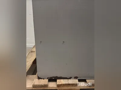 Metal security cabinet with 32 small compartments