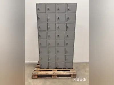 Metal security cabinet with 32 small compartments