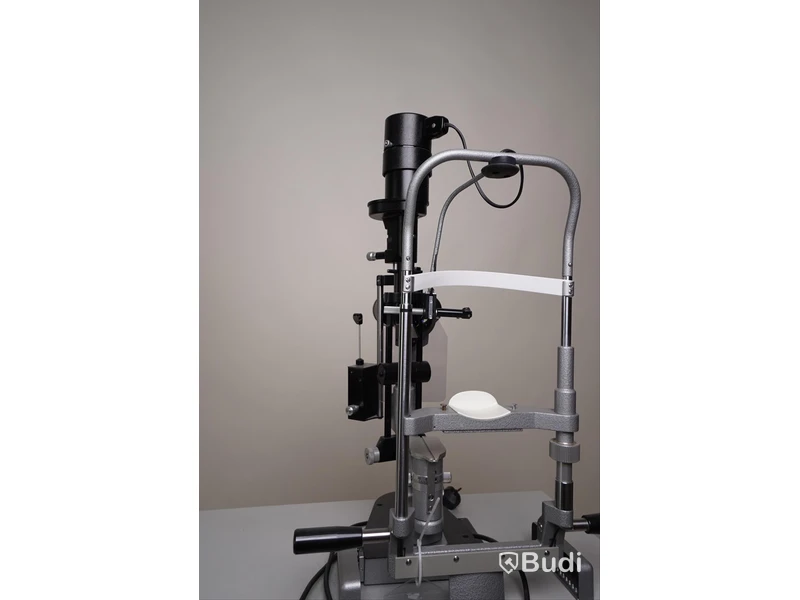 Optiker utrustning, undersökningsbord. Spaltlampa Haag-Streit 900
