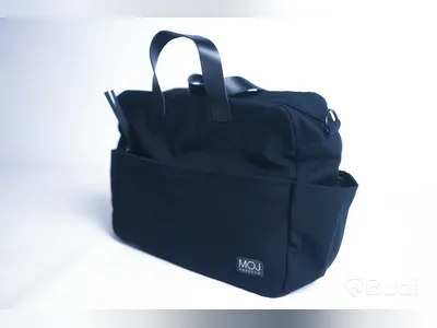 Skötväska - MOJ Sweden, Juni, svart. Bomullscanvas och skinn. Ny, Obruten förpackning.