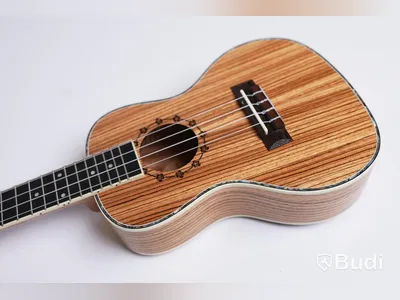 Ukulele - Koki'o, Zebrawood inkl. soft case, RISA Musical Instruments. Ny, Obruten förpackning.