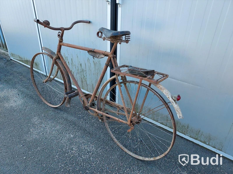 Patinerad Polstjärnan herrcykel av äldre modell