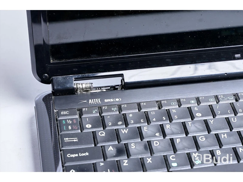Bärbar dator – Asus X5DI  rensad, inget OS, inkl. laddare, lätt kosmetisk skada vid skärmfäste, samt skadad batterilucka.