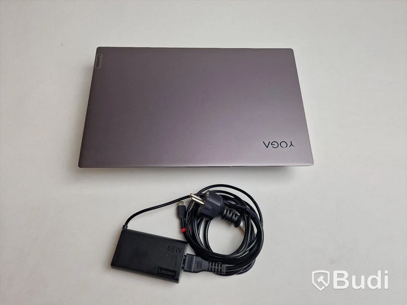 1 st Lenovo Yoga Slim 7, ord. pris ink. moms ca: 11000 kr