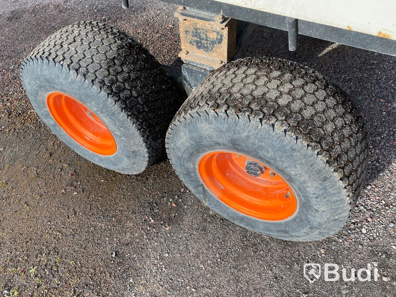 Hjulgrävare med tiltrotator och släp. Bobcat E57W