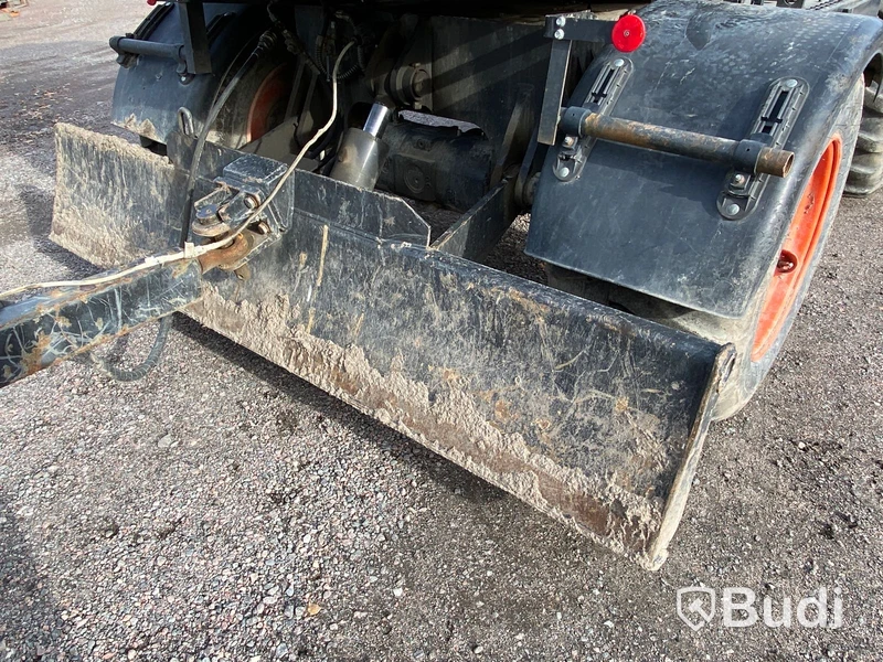 Hjulgrävare med tiltrotator och släp. Bobcat E57W