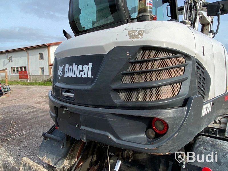 Hjulgrävare med tiltrotator och släp. Bobcat E57W