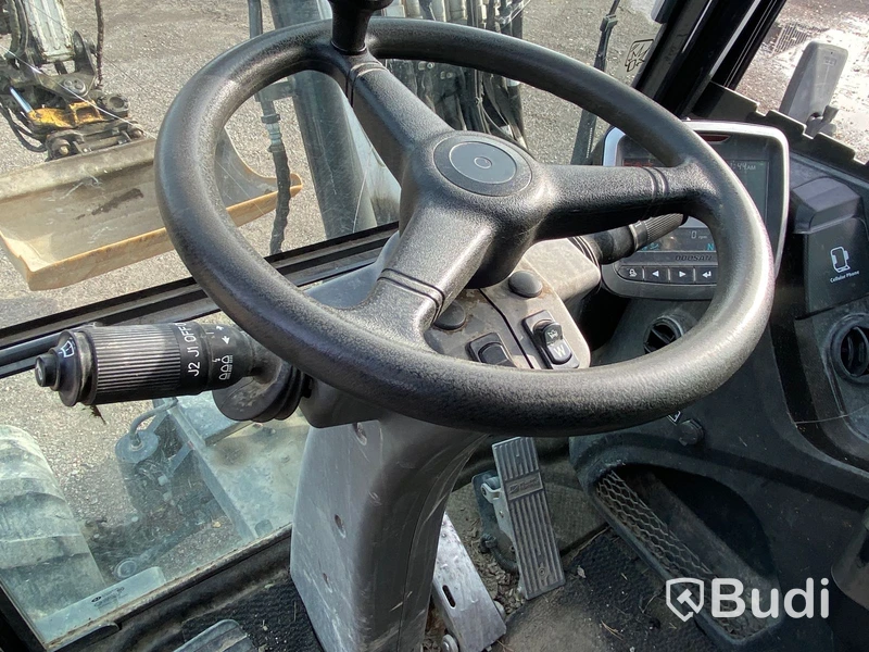 Hjulgrävare med tiltrotator och släp. Bobcat E57W
