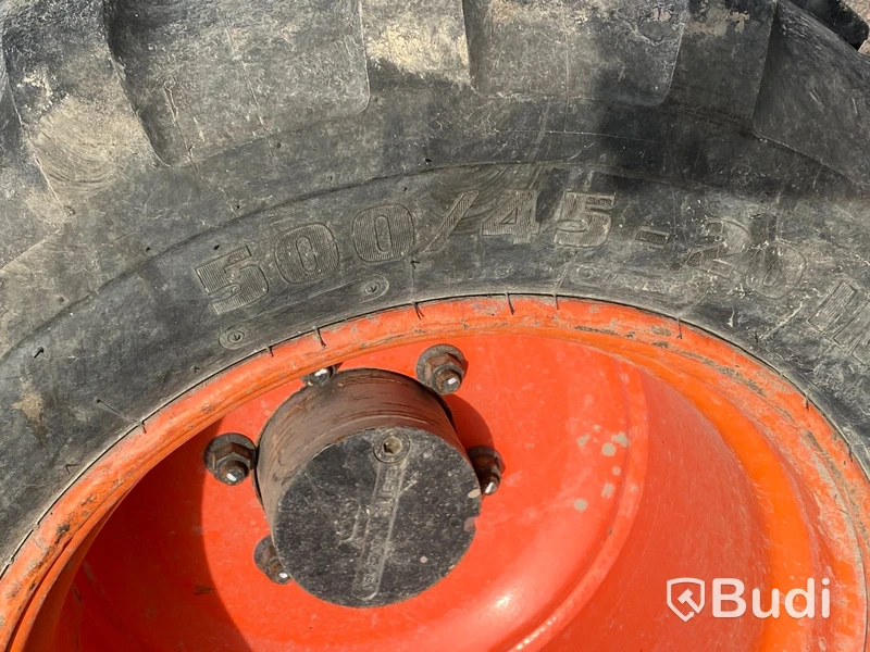 Hjulgrävare med tiltrotator och släp. Bobcat E57W
