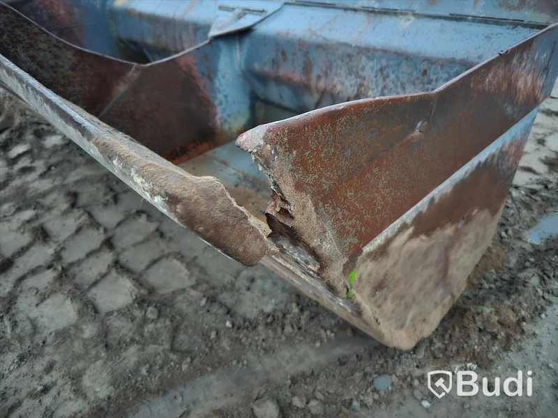 Hydraulisk slänt/planeringsskopa