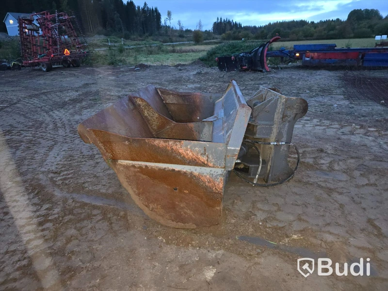 Hydraulisk slänt/planeringsskopa
