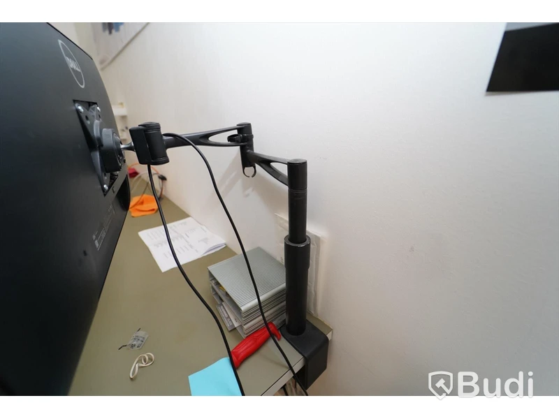 Dell skärm på svängarm. Dell U2515Hc