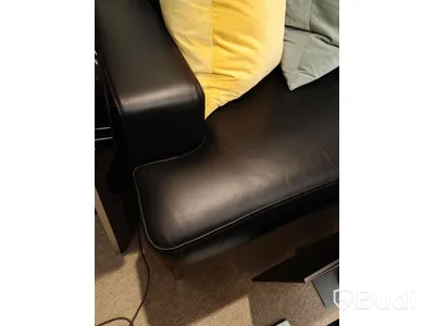 Soffa svart skinn